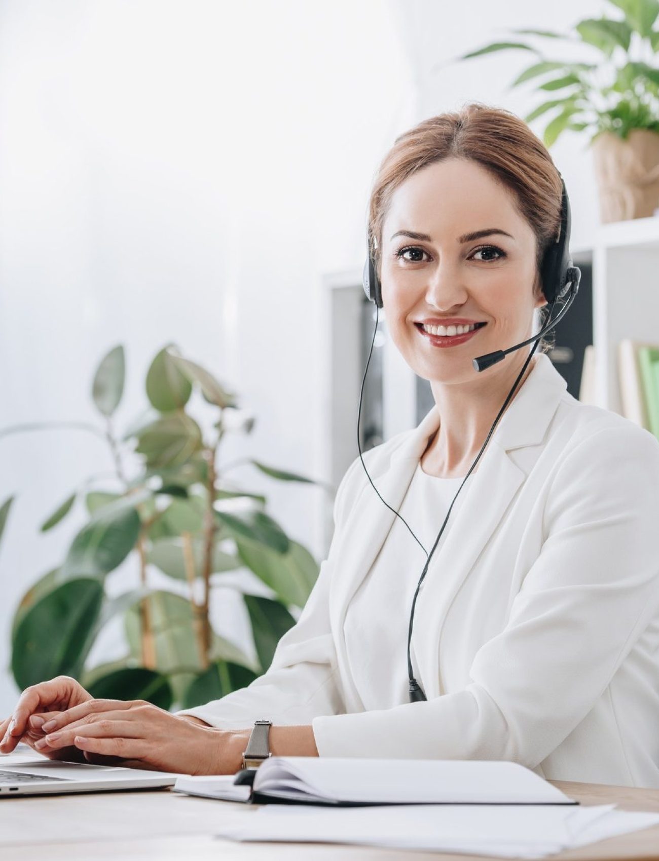 support-operator-working-with-headset-and-laptop-in-call-center-e1622090004440.jpg