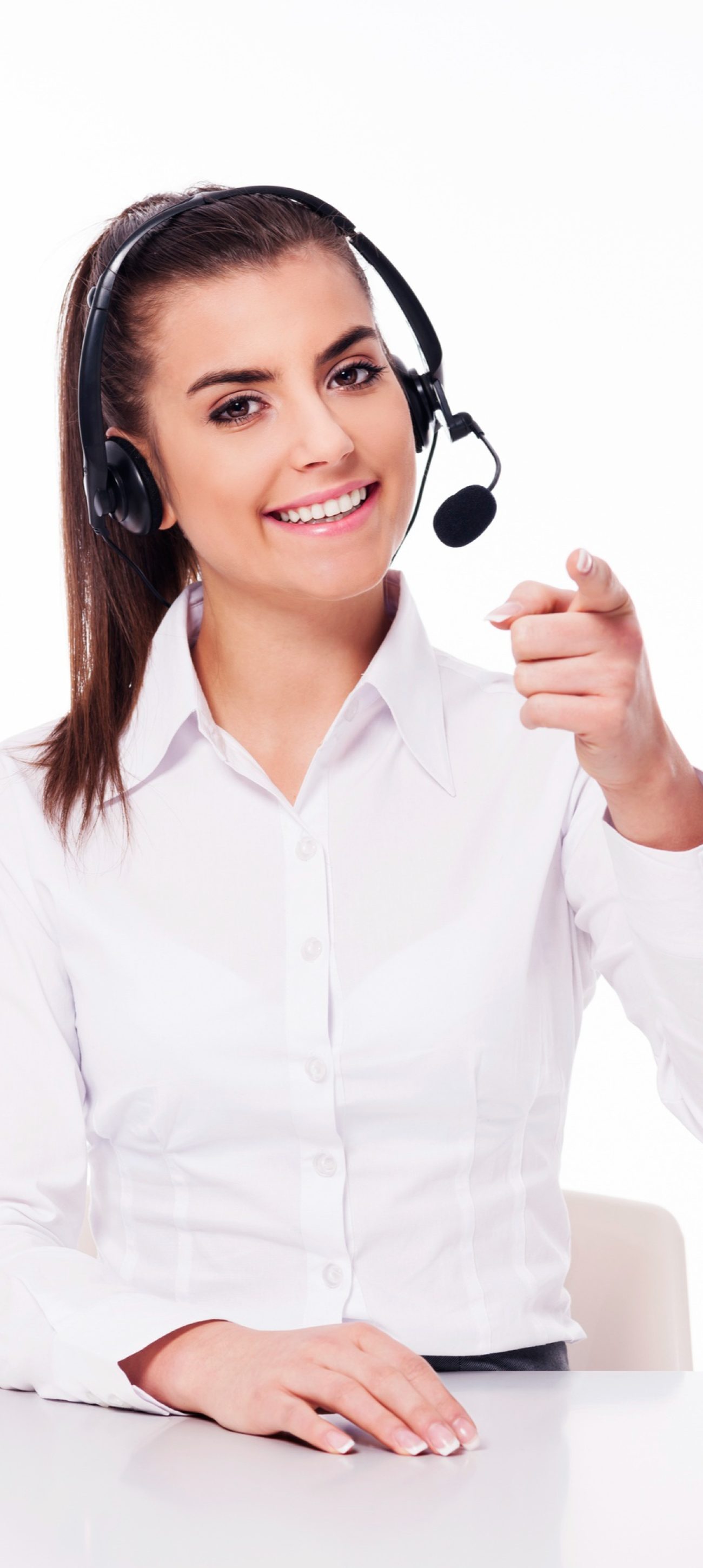 woman-with-headset-pointing-you